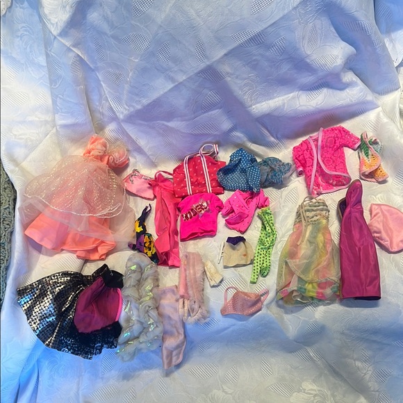 Vintage Barbie brand doll clothes and more